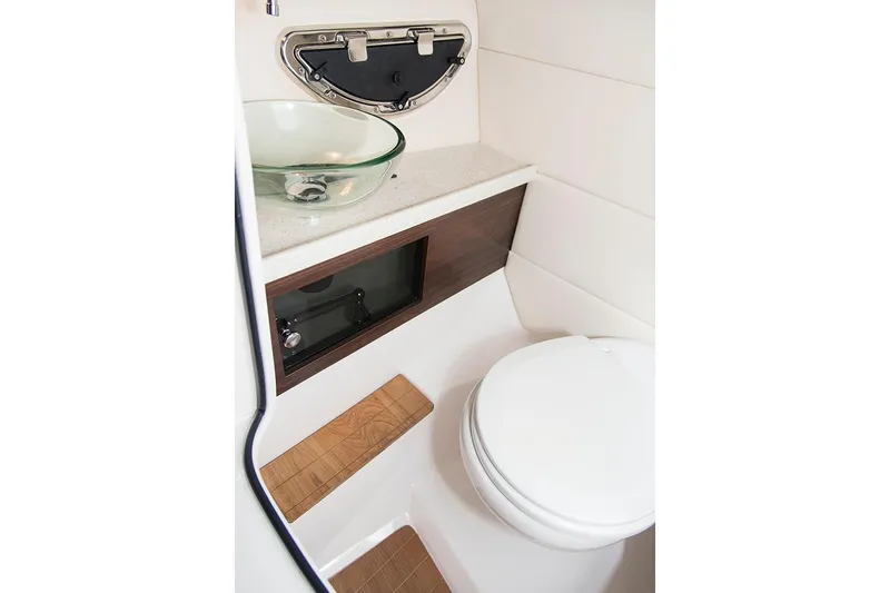  Yacht Photos Pics Manufacturer Provided Image: 2019 Regal 2800 Bowrider boat bathroom with modern sink and toilet.