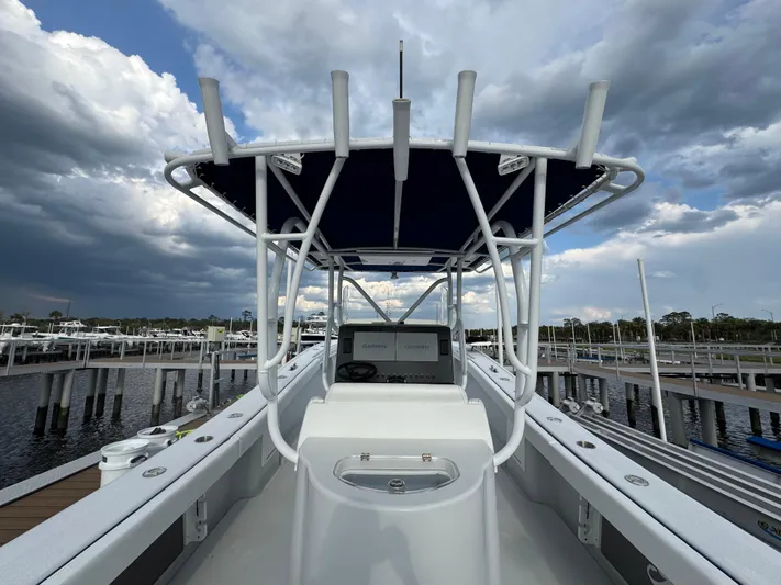  Yacht Photos Pics 2003 Yellowfin 36 Offshore boat docked under cloudy skies.
