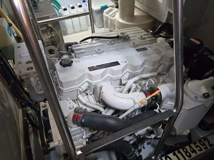 Ecola Yacht Photos Pics Engine room of 2005 American Tug 34 Pilothouse, showcasing detailed machinery and components.