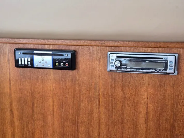 Ecola Yacht Photos Pics Audio system controls on 2005 American Tug 34 Pilothouse boat interior.