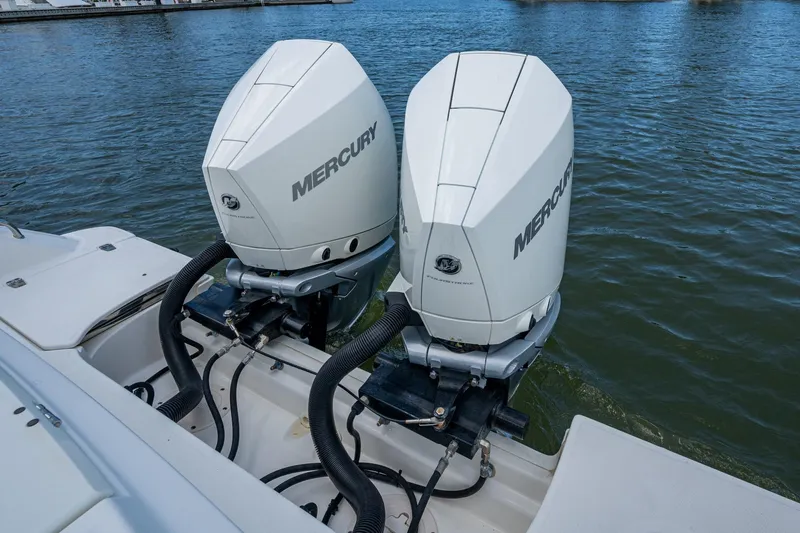Ducky's Dinghy Yacht Photos Pics Twin Mercury outboard engines on a 2020 Boston Whaler 330 Outrage boat.