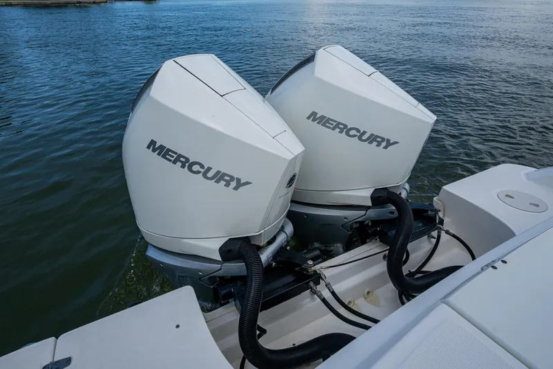Ducky's Dinghy Yacht Photos Pics Twin Mercury outboard engines on a 2020 Boston Whaler 330 Outrage boat.