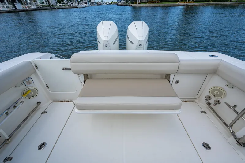 Ducky's Dinghy Yacht Photos Pics 2020 Boston Whaler 330 Outrage boat with comfortable seating and dual Mercury engines.