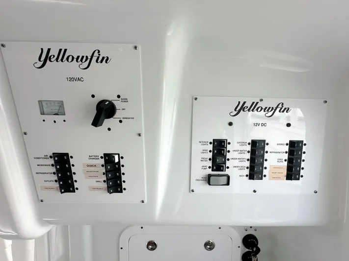  Yacht Photos Pics Control panels on a 2023 Yellowfin 42 boat, featuring 120VAC and 12VDC systems.