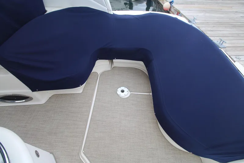  Yacht Photos Pics 2008 Sea Ray 340 Sundancer boat seating area with navy blue cover.