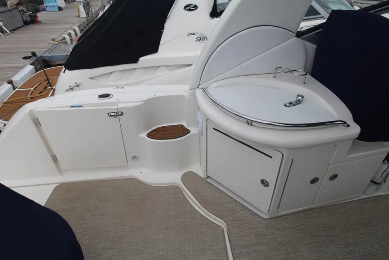  Yacht Photos Pics 2008 Sea Ray 340 Sundancer boat interior with sink and storage compartments.