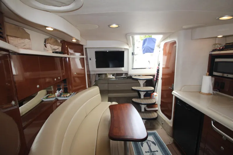  Yacht Photos Pics Luxurious interior of 2008 Sea Ray 340 Sundancer yacht with modern amenities and elegant design.