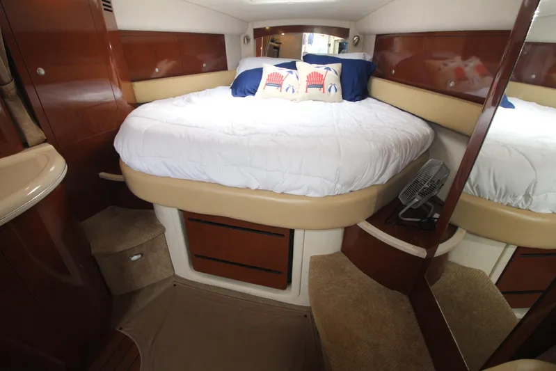  Yacht Photos Pics 2008 Sea Ray 340 Sundancer cabin with cozy bed and nautical decor.