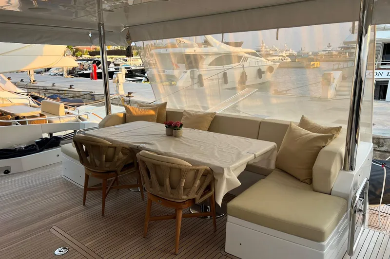  Yacht Photos Pics Luxurious 2015 Azimut 80 yacht deck with elegant dining area and marina view.