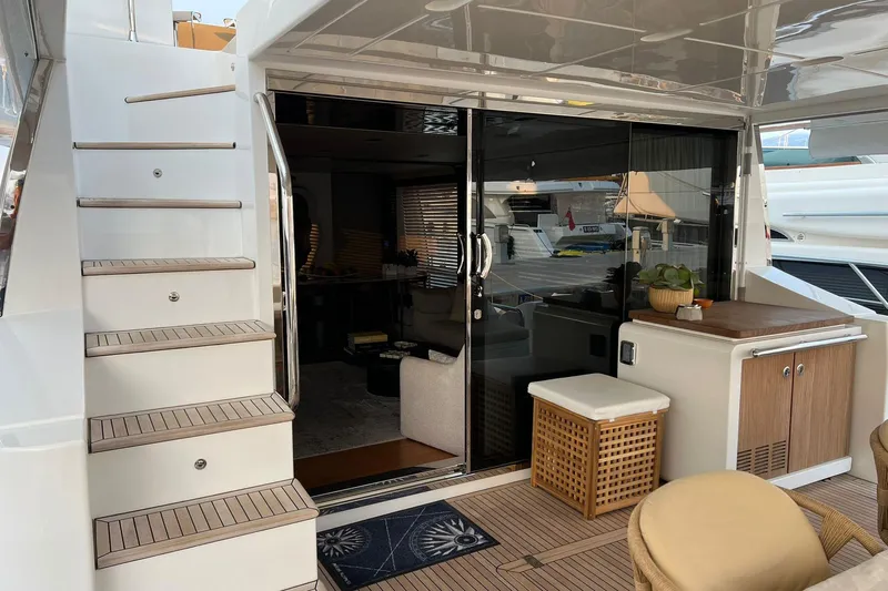  Yacht Photos Pics Luxury Azimut 80 yacht interior with stairs and elegant wooden decor, 2015 model.