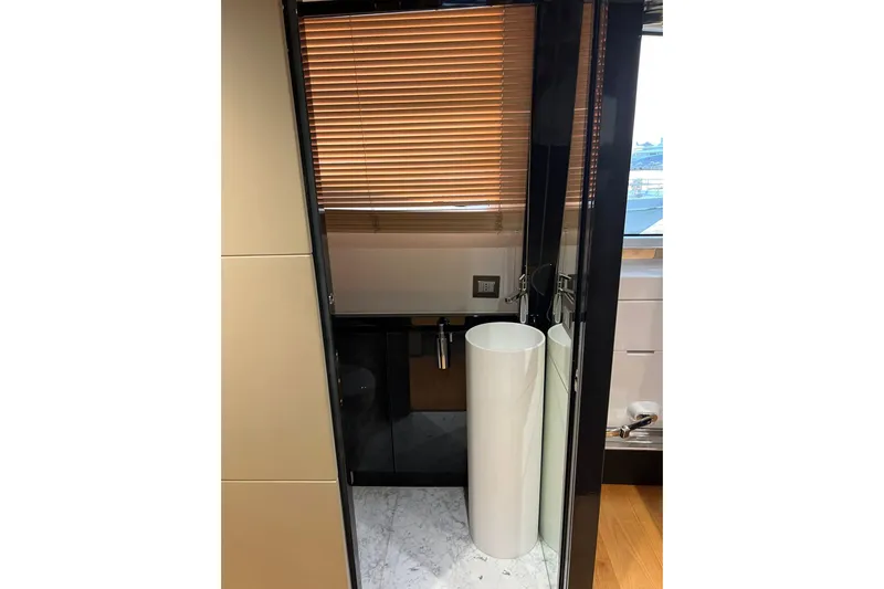  Yacht Photos Pics Luxurious bathroom interior on a 2015 Azimut 80 yacht, featuring modern design elements.