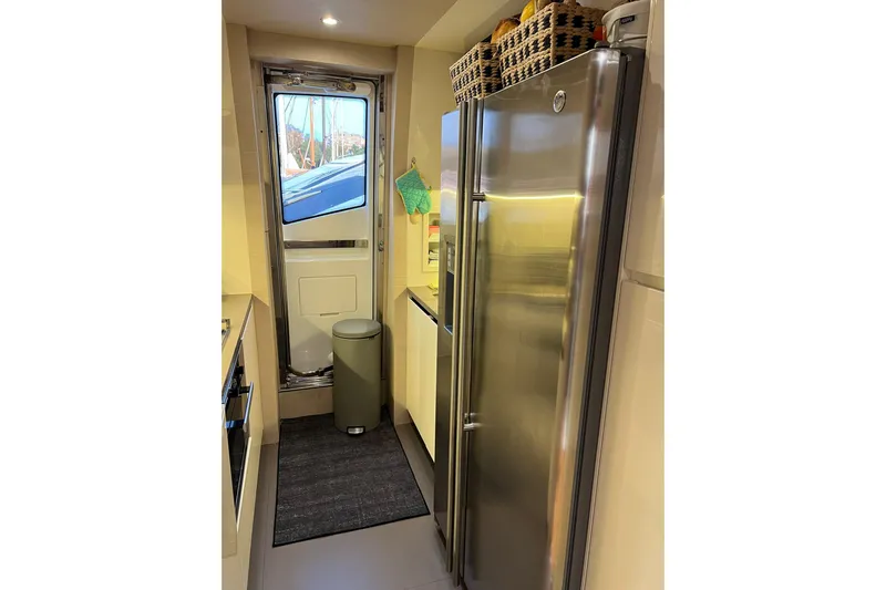  Yacht Photos Pics Modern kitchen interior of 2015 Azimut 80 yacht with stainless steel appliances.