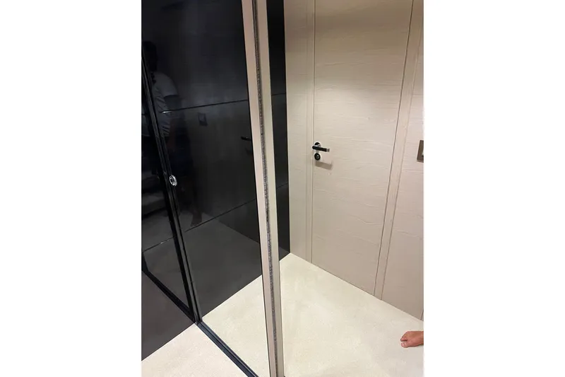  Yacht Photos Pics Modern interior of 2015 Azimut 80 yacht with sleek black and white design.