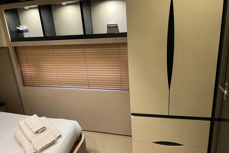  Yacht Photos Pics Luxurious interior of 2015 Azimut 80 yacht with modern cabinetry and soft lighting.