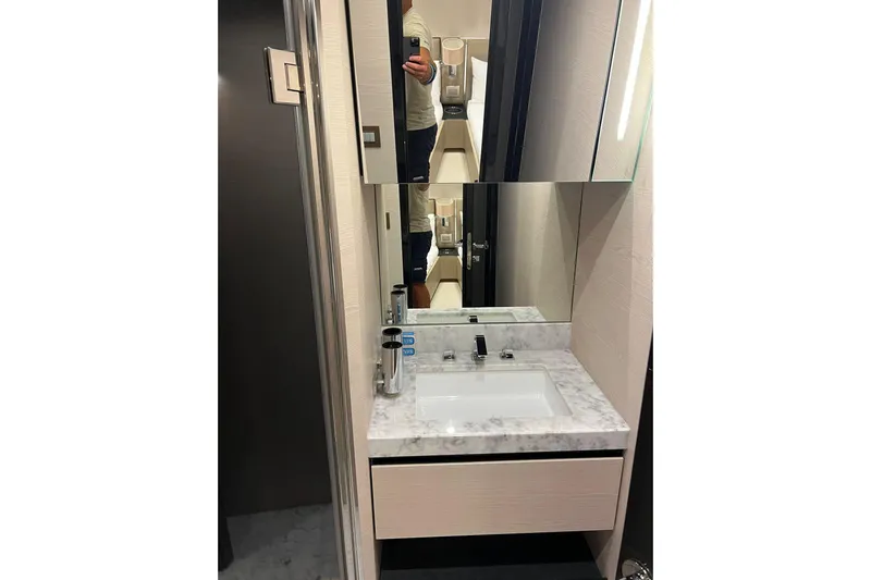  Yacht Photos Pics Modern bathroom vanity with marble countertop in 2015 Azimut 80 yacht.