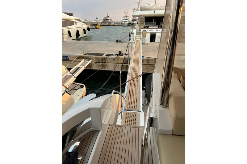  Yacht Photos Pics Luxury Azimut 80 yacht docked at marina, featuring elegant wooden deck, 2015 model.