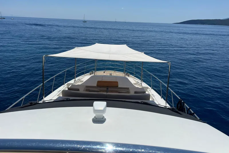  Yacht Photos Pics Luxurious 2015 Azimut 80 yacht cruising on calm blue waters.