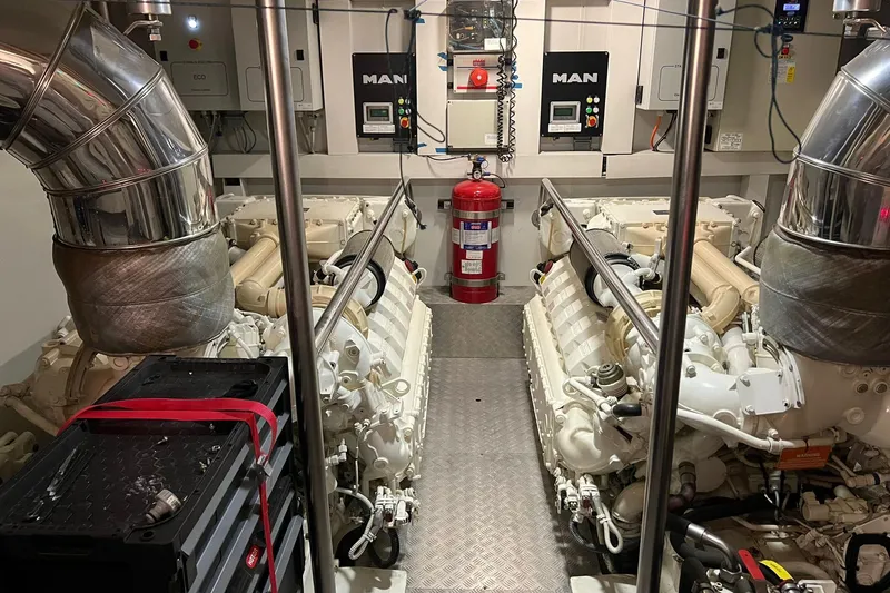  Yacht Photos Pics Engine room of a 2015 Azimut 80 yacht, featuring dual MAN engines.