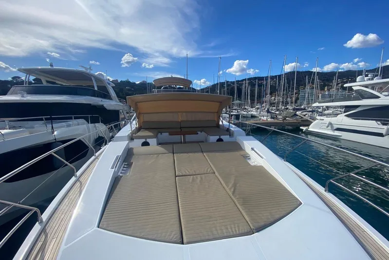  Yacht Photos Pics Luxurious 2016 Azimut 77S yacht with spacious sun deck in marina setting.