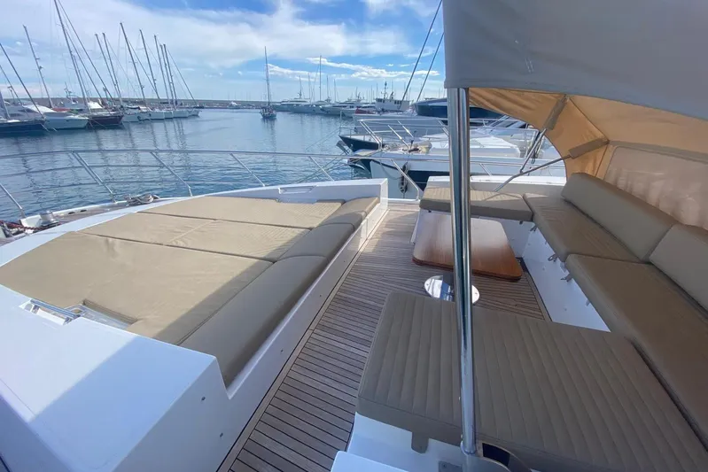  Yacht Photos Pics Luxurious 2016 Azimut 77S yacht with spacious deck and comfortable seating in marina.