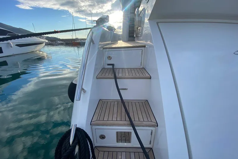  Yacht Photos Pics Staircase on 2016 Azimut 77S yacht with scenic marina view.