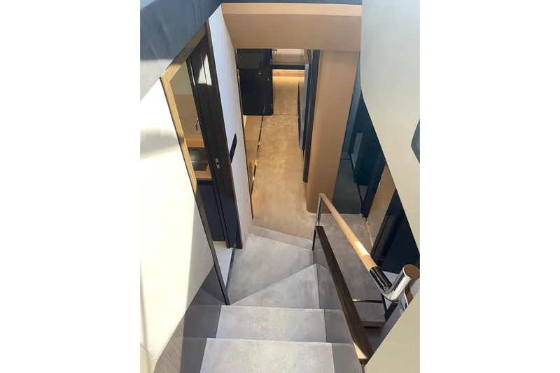  Yacht Photos Pics Interior staircase of 2016 Azimut 77S yacht, featuring modern design and elegant finishes.