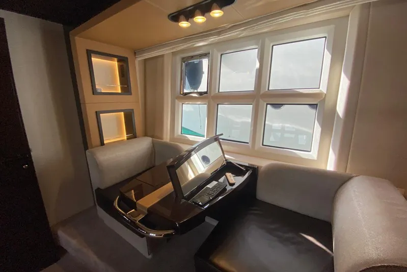  Yacht Photos Pics Luxurious interior of 2016 Azimut 77S yacht with elegant seating and large windows.