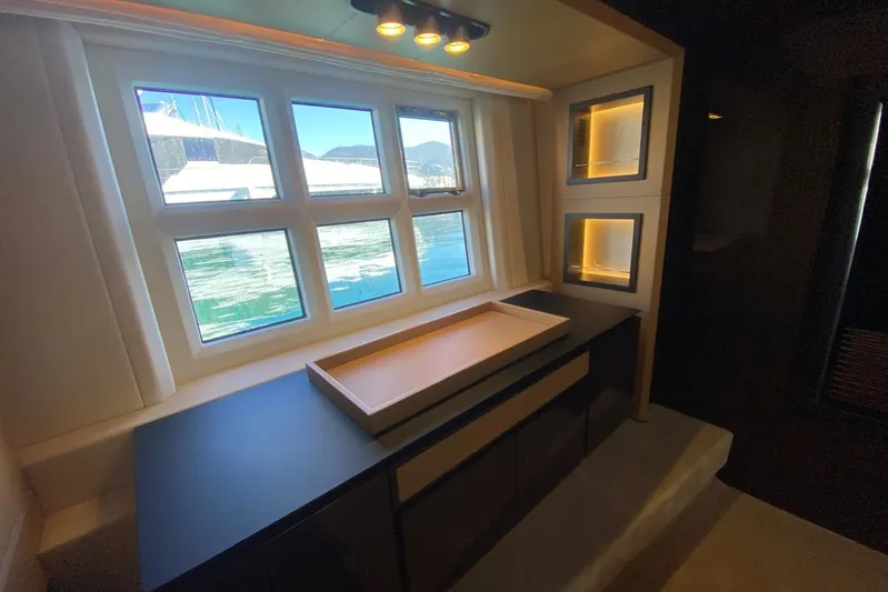  Yacht Photos Pics Luxurious interior of 2016 Azimut 77S yacht with elegant window view.