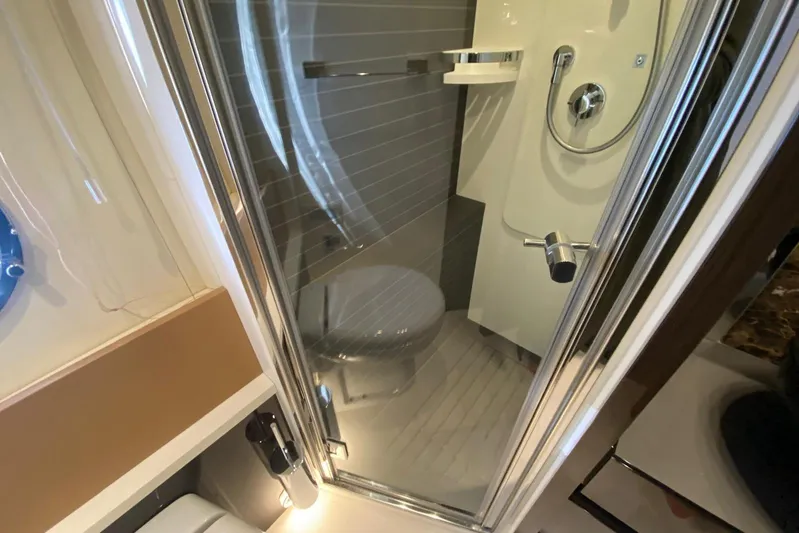  Yacht Photos Pics Bathroom interior of 2016 Azimut 77S yacht with modern shower and fixtures.