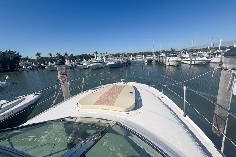 Luna Yacht Photos Pics 2008 Sea Ray 380 Sundancer docked in a sunny marina with clear blue skies.