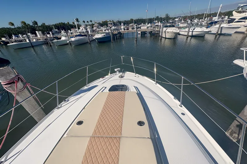 Luna Yacht Photos Pics Bow view of 2008 Sea Ray 380 Sundancer docked in a marina.
