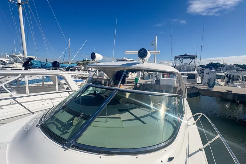 Luna Yacht Photos Pics 2008 Sea Ray 380 Sundancer docked in marina under sunny skies.