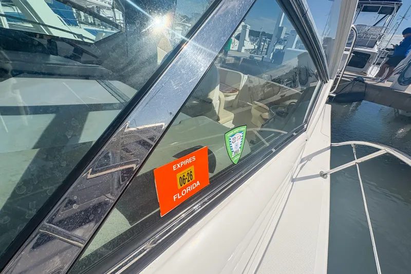 Luna Yacht Photos Pics 2008 Sea Ray 380 Sundancer with Florida registration sticker on window.