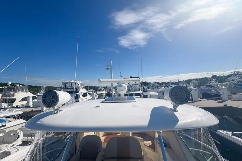 Luna Yacht Photos Pics 2008 Sea Ray 380 Sundancer yacht docked at marina under clear blue sky.