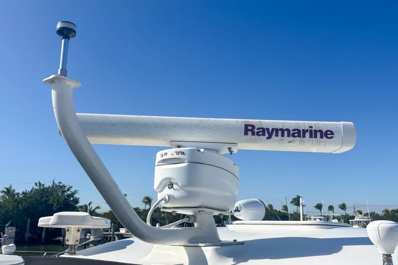 Luna Yacht Photos Pics Radar equipment on 2008 Sea Ray 380 Sundancer, featuring Raymarine technology against clear blue sky.