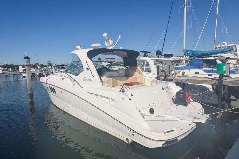 Luna Yacht Photos Pics 2008 Sea Ray 380 Sundancer yacht docked at a marina under clear blue skies.