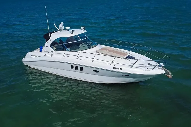 Luna Yacht Photos Pics 2008 Sea Ray 380 Sundancer yacht cruising on clear blue water.