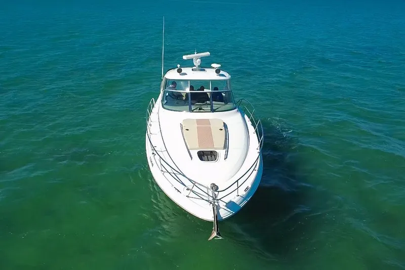 Luna Yacht Photos Pics 2008 Sea Ray 380 Sundancer cruising on clear blue water.