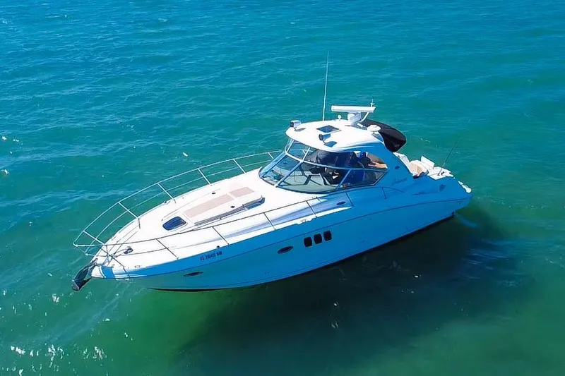 Luna Yacht Photos Pics 2008 Sea Ray 380 Sundancer yacht cruising on clear blue waters.