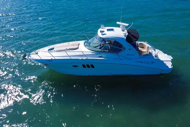 Luna Yacht Photos Pics 2008 Sea Ray 380 Sundancer yacht cruising on clear blue water.