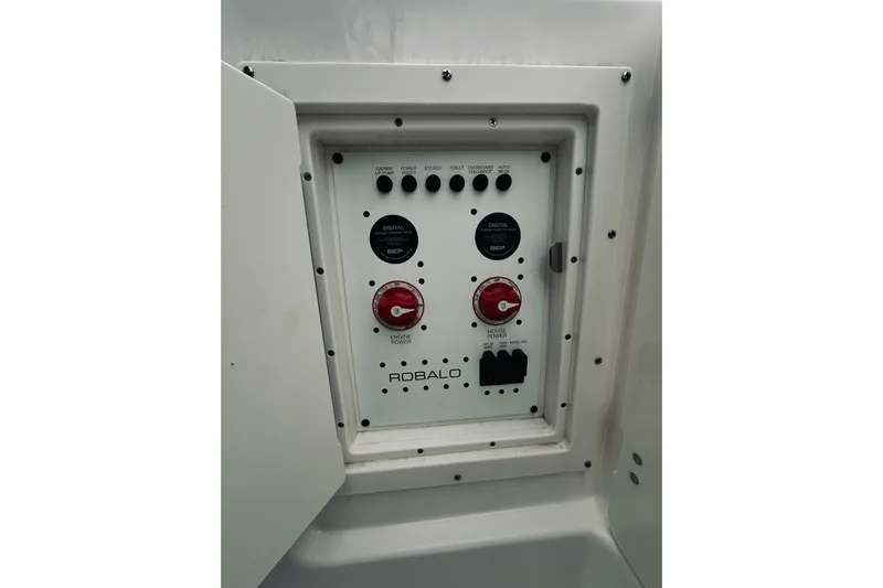 Robalo 272 Yacht Photos Pics Control panel of 2022 Robalo R272 Center Console boat with switches and dials.