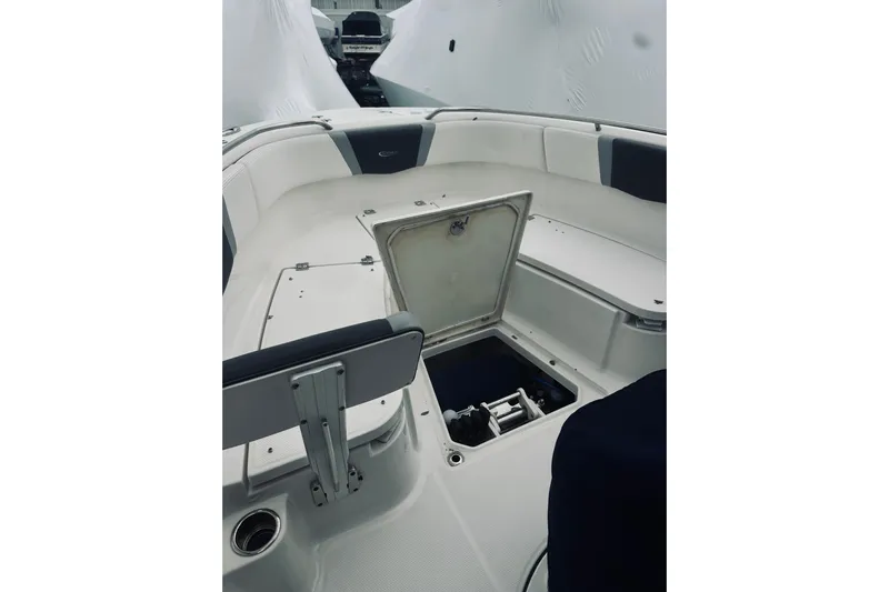 Robalo 272 Yacht Photos Pics 2022 Robalo R272 Center Console boat interior with open storage compartment.