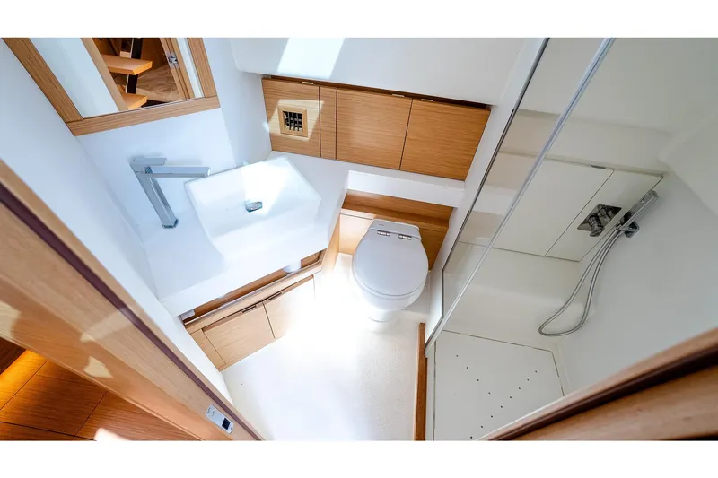  Yacht Photos Pics Luxurious bathroom interior of 2024 Pardo Yachts 43, featuring modern fixtures and wood accents.