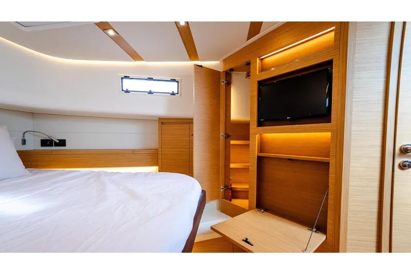  Yacht Photos Pics Luxurious interior of 2024 Pardo Yachts 43, featuring a cozy bedroom with modern amenities.