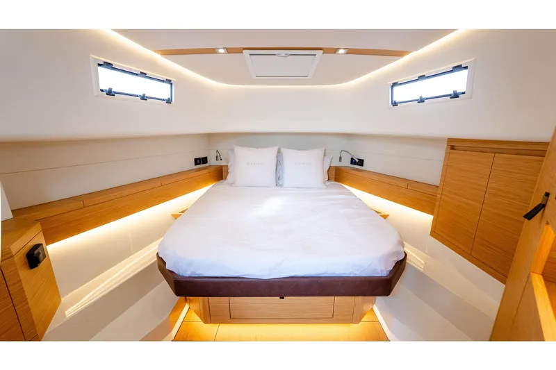 Yacht Photos Pics Luxurious cabin interior of 2024 Pardo Yachts 43, featuring elegant wood finishes and modern design.