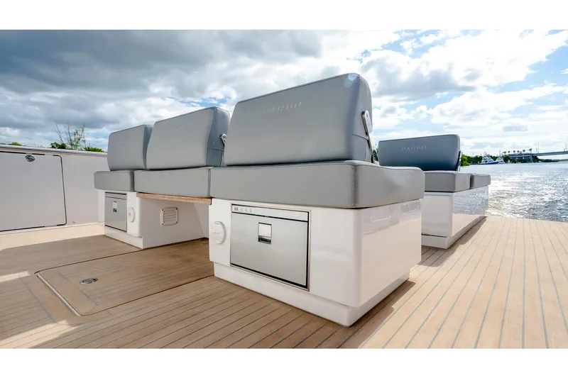  Yacht Photos Pics 2024 Pardo Yachts 43 interior with sleek seating and storage, overlooking serene waters.