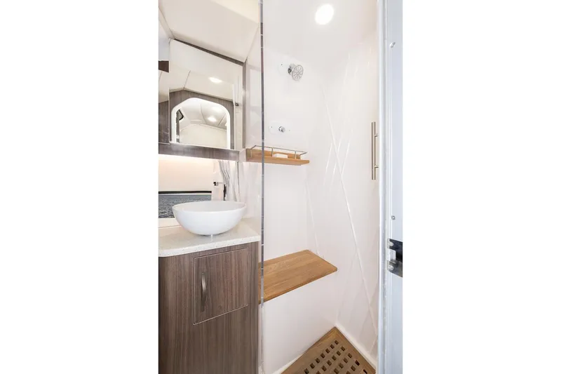  Yacht Photos Pics Manufacturer Provided Image: 2019 Regal 33 SAV boat bathroom with modern sink and shower.