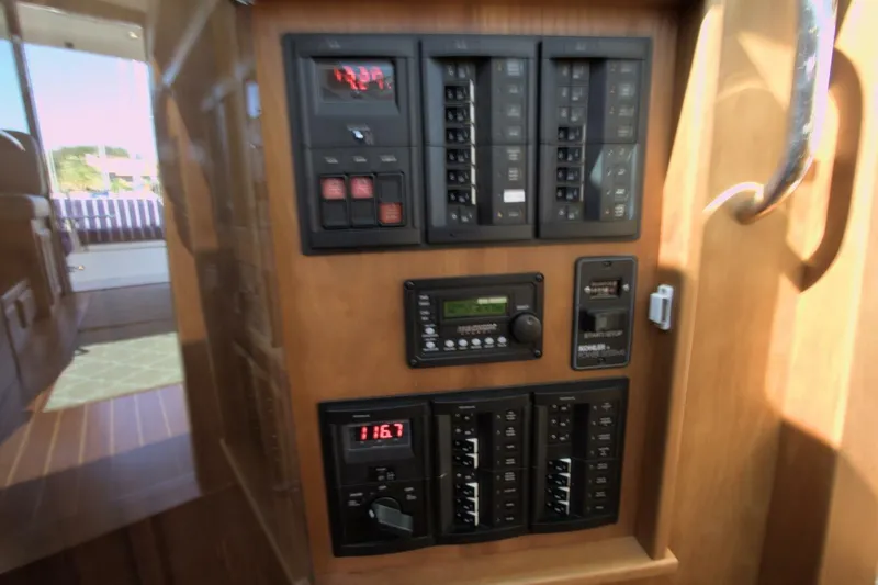 Flight Level Zero Yacht Photos Pics Electrical control panel on 2013 Sabre 38 Salon Express yacht interior.