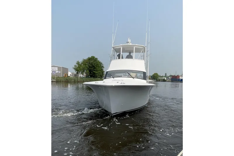 Lady Faye Yacht Photos Pics 2018 Viking 37 Billfish yacht cruising on a calm waterway.