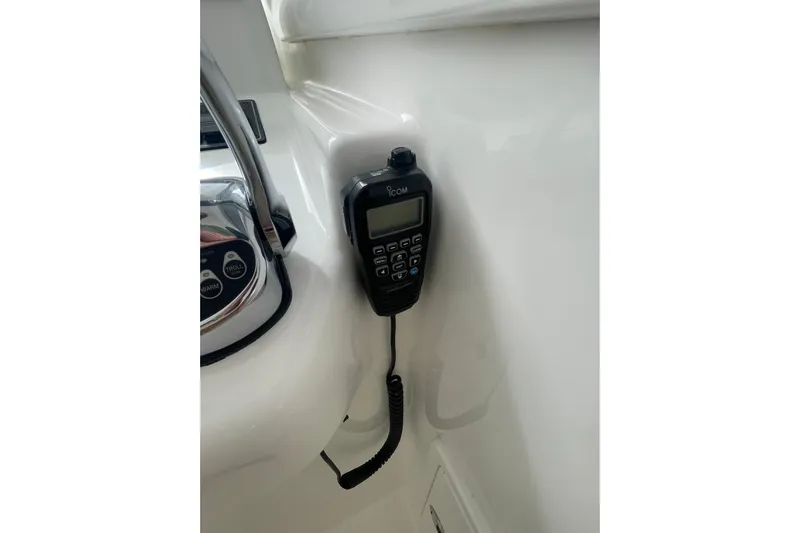 Lady Faye Yacht Photos Pics VHF radio on 2018 Viking 37 Billfish boat dashboard.